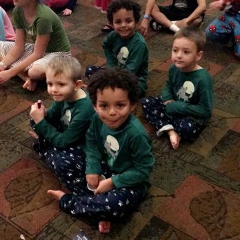 Great Wolf Lodge - Story time under the Great Clock before bed in their wolf jamnies. - Resorts Near Me - Centralia, Washington