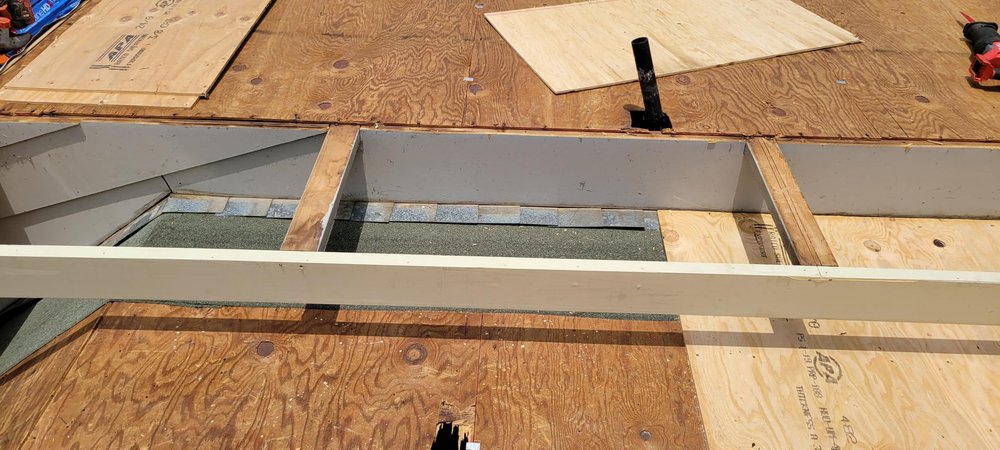 Slide of Higher Level Roofing