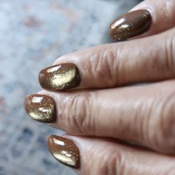 Galaxy Nails & Spa - This is the cat eye technical finish.