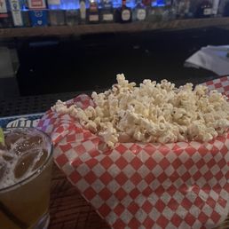 Free popcorn and amaretto sour (great happy hour price!)