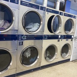 Dryers with dry laundry waiting on worker to empty before I can use. I asked & they said "I have no where to put so it stays"