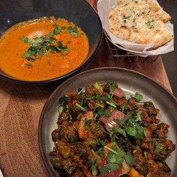 The Blue Taj - Garlic naan, paneer Tikka masala, bhindi masala - Indian Near Me - Charlotte, North Carolina The Blue Taj - Garlic naan, paneer Tikka masala, bhindi masala - Indian Near Me - Charlotte, North Carolina