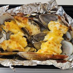 Cha Express - Baked Mussels with Cheese and Garlic ($11.95). Very good stuff. Would order again.
