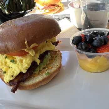Acai Jungle Cafe - Breakfast egg sandwich (add bacon and add avocado), side of fruit cup - Sandwiches Near Me - Burbank, California Acai Jungle Cafe - Breakfast egg sandwich (add bacon and add avocado), side of fruit cup - Sandwiches Near Me - Burbank, California