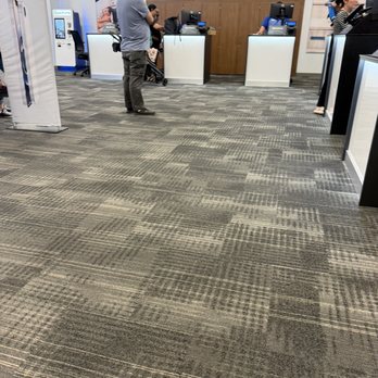 Spectrum - Luis just ignoring the fact there is multiple customers waiting and he's just standing there talking to his co worker - Internet Service Providers Near Me - West Covina, California