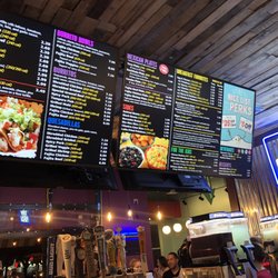 Fuzzy's Taco Shop - Menu above cashiers