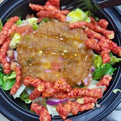 Chicken bowl with Hot Honey and flaming hot Cheetos