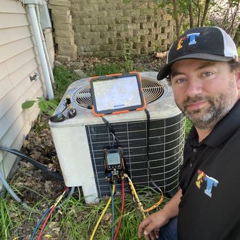 Full Time Heating & Cooling - HVAC tech using a manifold gauge set to service an air conditioning unit. - Heating & Air Conditioning/HVAC Near Me - Watertown, Minnesota Full Time Heating & Cooling - HVAC tech using a manifold gauge set to service an air conditioning unit. - Heating & Air Conditioning/HVAC Near Me - Watertown, Minnesota