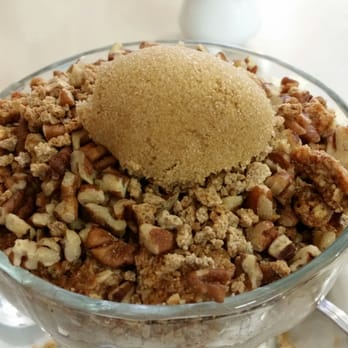Bear Paw Cafe - Cinnamon oatmeal topped with granola, pecans and brown sugar. They had a pitcher of syrup for it too. Nah. - Coffee & Tea Near Me - St. George, Utah