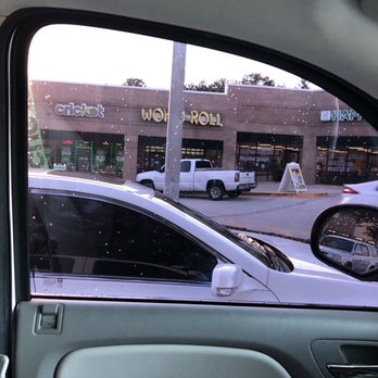 Wok-N-Roll - ows a view of a parking lot from inside a car - Chinese Near Me - Jacksonville, Florida