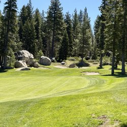 Coyote Moon Golf Course - The green on 12 with boulders.