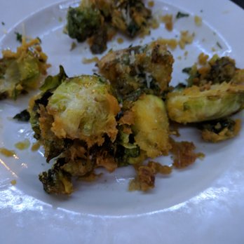 The Ramp - Crispy Brussels Spouts (after half was consumed). Lightly breaded which is nice. Didn't come with the sauce as described. - Sports Bars Near Me - Akron, Ohio The Ramp - Crispy Brussels Spouts (after half was consumed). Lightly breaded which is nice. Didn't come with the sauce as described. - Sports Bars Near Me - Akron, Ohio