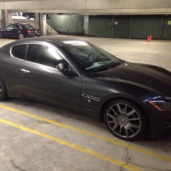Royal Crown Autoworks - Before: OEM gunmetal grey rims on my Maserati Granturismo - Body Shops Near Me - Gardena, California Royal Crown Autoworks - Before: OEM gunmetal grey rims on my Maserati Granturismo - Body Shops Near Me - Gardena, California