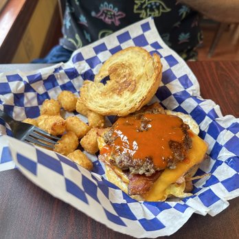 Nonie's Bakery & Cafe - Meat lovers croissant and tater tots - Breakfast & Brunch Near Me - North Utica, Illinois Nonie's Bakery & Cafe - Meat lovers croissant and tater tots - Breakfast & Brunch Near Me - North Utica, Illinois