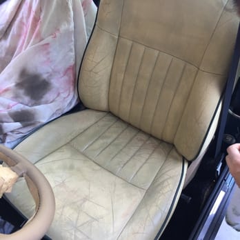 Magic Touch Restoration - Before leather seat and steering wheel picture of 1979 Mini Cooper classic - Auto Detailing Near Me