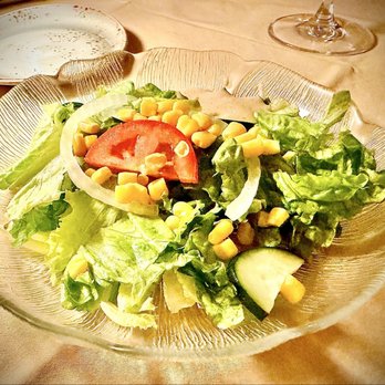 Nouvelle Cuisine - Side salads are very nice with a lovely house made vinaigrette OuiOui. - French Near Me - Spring Hill, Florida
