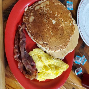 Papys Place - Two huge pancakes with three eggs and bacon. - Breakfast & Brunch Near Me - Anthony, Florida
