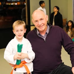 Shotokan Karate Leadership School - A proud instructor with one of our great students!