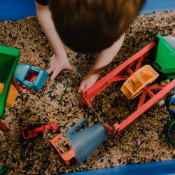 University Ravenna Cooperative Preschool - There's a new material in the Sensory Table each week.
