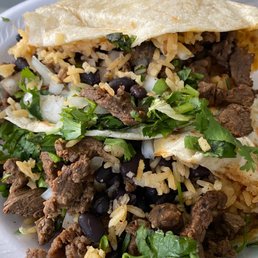 "Burrito" was folded not wrapped. $13 for a bowl with a tortilla on top. "Burrito" was folded not wrapped. $13 for a bowl with a tortilla on top.