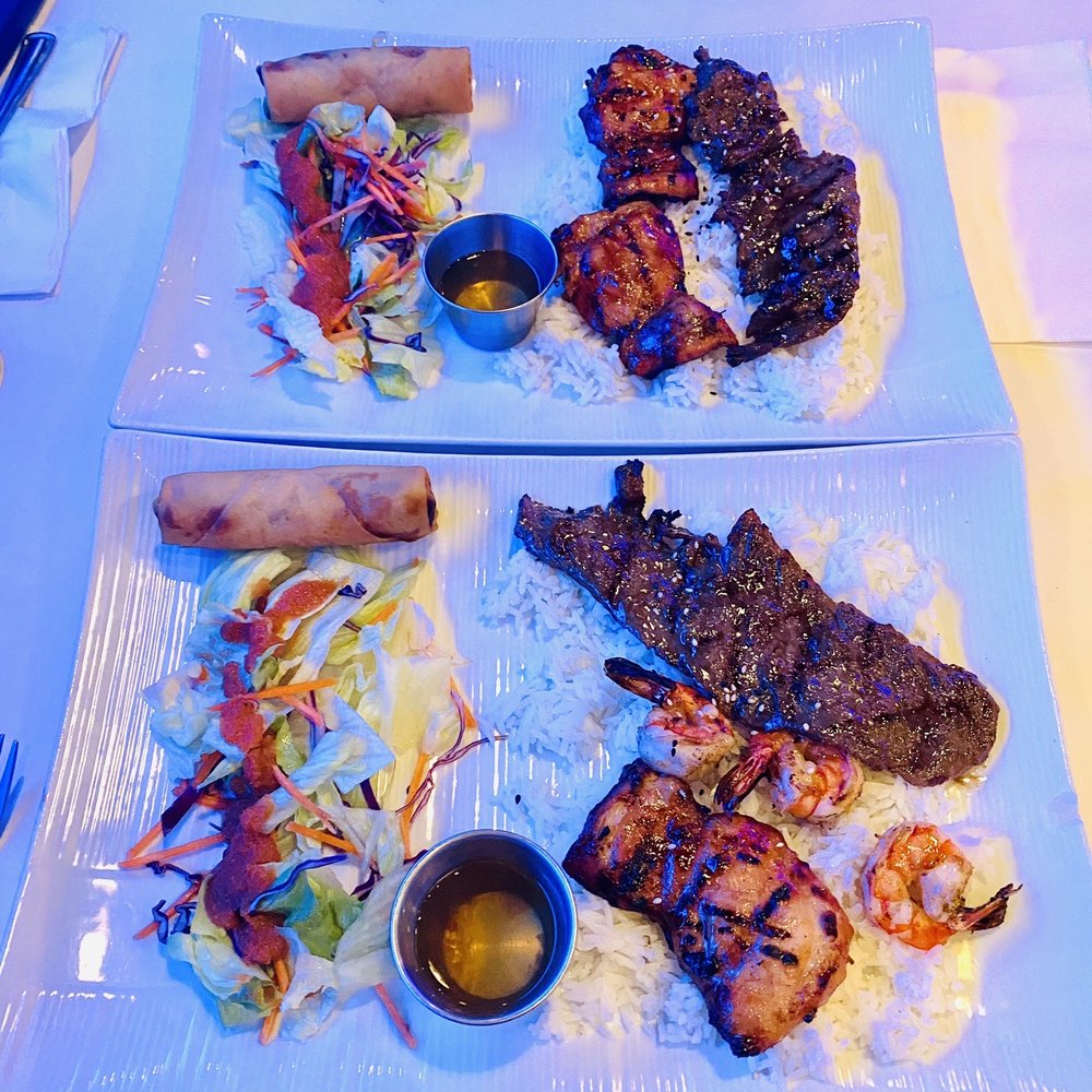Sushi Do - two plates of food on a table - Sushi Bars Near Me - Laval, Quebec Sushi Do - two plates of food on a table - Sushi Bars Near Me - Laval, Quebec