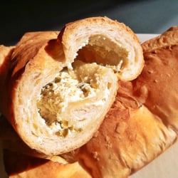La Azteca Bakery - Bolillo: Savory Bread filled with Cheese and Jalapenos.  Awesome!  Baked fresh only on Fridays.