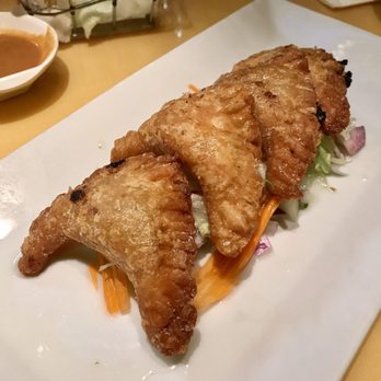 Topaz Thai Authentic - Curry Puff- Puff pastry stuffed with ground chicken, potatoes, onions, curry powder served with cucumber salad - Thai Near Me - New York, New York Topaz Thai Authentic - Curry Puff- Puff pastry stuffed with ground chicken, potatoes, onions, curry powder served with cucumber salad - Thai Near Me - New York, New York