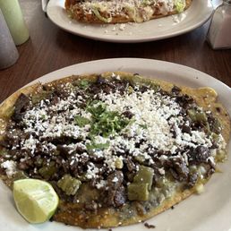Huarache Con Carne y Nopales below and Quesadilla de Chicharron above that. Huarache Con Carne y Nopales below and Quesadilla de Chicharron above that.