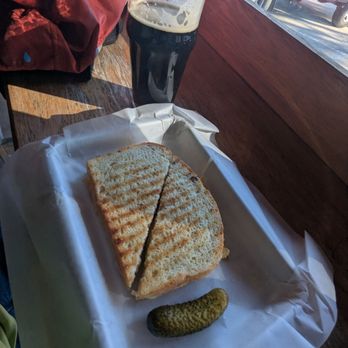 Donner Creek Brewing - Grilled cheese sandwich with sliced pickle inside. - Cideries Near Me - Truckee, California