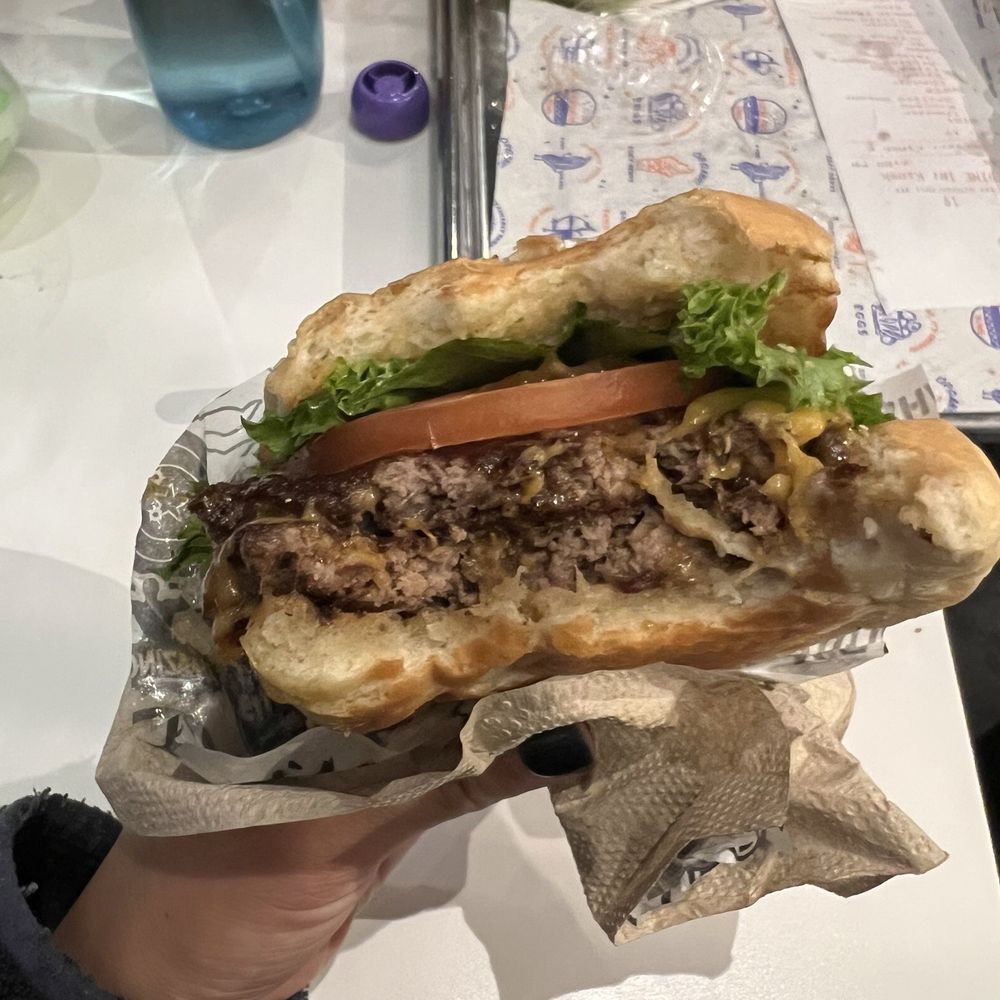SUPER BURGER with cheese and grilled onions