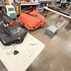 Liferaft & Marine Safety Equipment - Inside the workshop, where the manager demonstrated materials and techniques for repairing my inflatable.