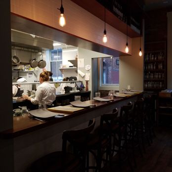 Buttercup - Looking in kitchen - Bars Near Me - Natick, Massachusetts