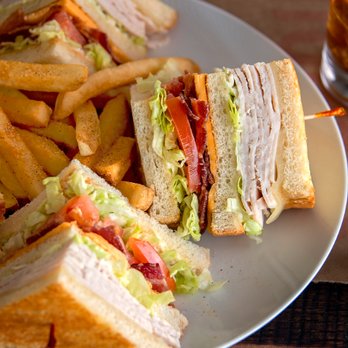 Shoney's - You do not want to miss out on our Turkey Club Sandwich! Slow-roasted turkey breast, hickory-smoked bacon, American and Swiss... - Breakfast & Brunch Near Me - Branson, Missouri