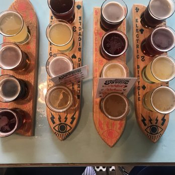 Electric Bicycle Brewing - When you hang with beer lovers...flights on flights! - Breweries Near Me - Vancouver, British Columbia