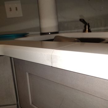 Berkut - a kitchen counter with a sink and faucet - General Contractors Near Me - Twinsburg, Ohio Berkut - a kitchen counter with a sink and faucet - General Contractors Near Me - Twinsburg, Ohio