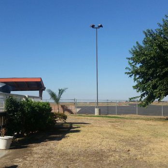 Airway Cafe - Patio area and part of airport - Cafes Near Me - Porterville, California Airway Cafe - Patio area and part of airport - Cafes Near Me - Porterville, California