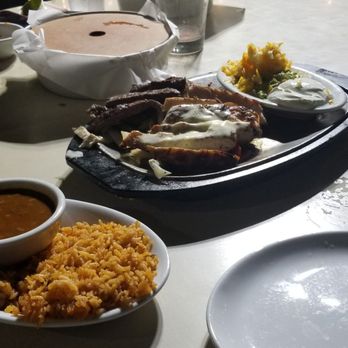 Uncle Julio's - Steak and chicken fajitas, rice and beans. Very good but skimpy portions. Definitely not worth $41.50 - Mexican Near Me - Fort Worth, Texas Uncle Julio's - Steak and chicken fajitas, rice and beans. Very good but skimpy portions. Definitely not worth $41.50 - Mexican Near Me - Fort Worth, Texas