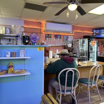 George's Breakfast Station - a man sitting at the counter - Breakfast & Brunch Near Me - Tarpon Springs, Florida