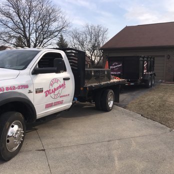 Motor City Disposal - Dropping off a 10 yard driveway safe dumpster for a commercial customer - Dumpster Rental Near Me - Roseville, Michigan Motor City Disposal - Dropping off a 10 yard driveway safe dumpster for a commercial customer - Dumpster Rental Near Me - Roseville, Michigan