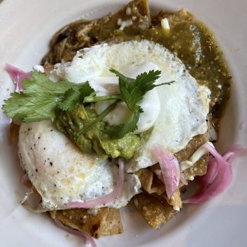 Azul 18 - "Spicy" green chilaquiles with cochinita pibil, eggs over-easy - New American Near Me - Chicago, Illinois