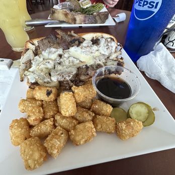 Beach Front Grille - I got the special Prime Rib dip sandwich w/tots - American Near Me - Flagler Beach, Florida Beach Front Grille - I got the special Prime Rib dip sandwich w/tots - American Near Me - Flagler Beach, Florida