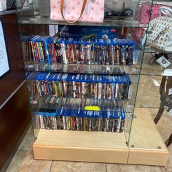 Loan Star Pawn - North Port - Dooney & Bourke bag and Blu-ray DVDs
