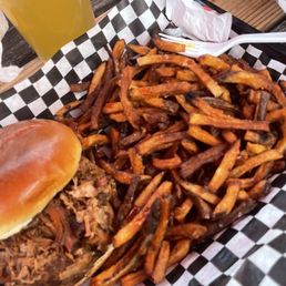 No sauce just dry pulled pork with burnt fries and a side of grainy mac n cheese and dry ribs. Go else where you're welcome.