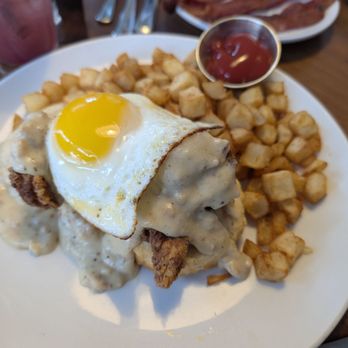 The Brunch Bar - Biscuits and chicken with sausage gravy and an egg. 10000% recommend! - Coffee & Tea Near Me - Rochester Hills, Michigan The Brunch Bar - Biscuits and chicken with sausage gravy and an egg. 10000% recommend! - Coffee & Tea Near Me - Rochester Hills, Michigan