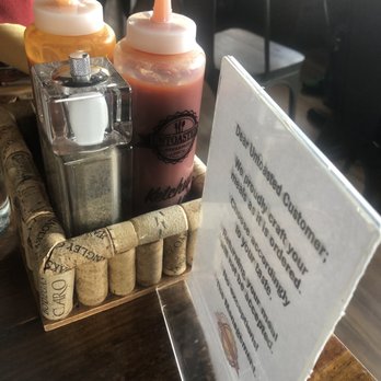 Untoasted - Cork rack full of condiments. - Breakfast & Brunch Near Me - Hallandale Beach, Florida Untoasted - Cork rack full of condiments. - Breakfast & Brunch Near Me - Hallandale Beach, Florida