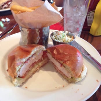 Hard Rock Cafe Amsterdam - Fries, super tiny cup of coleslaw and a Honey Mustard Chicken Sandwich for 15 Euros. Luckily the water and wifi was free. - American Near Me - Amsterdam, New Hampshire
