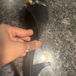 George's Shoe Store & Repair - Heel repair.