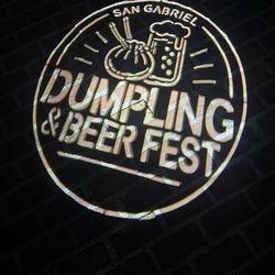 Sign under the entrance of beer garden