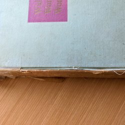 The A & H Bindery - Before: precariously held together with tape and some threadbare fabric
