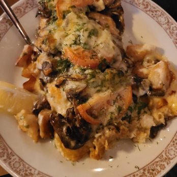 Uzbekistan Restaurant - Moscow Fish - sea bass filet baked with mushrooms, tomatoes, potatoes topped with cheese. - Uzbek Near Me - Philadelphia, Pennsylvania Uzbekistan Restaurant - Moscow Fish - sea bass filet baked with mushrooms, tomatoes, potatoes topped with cheese. - Uzbek Near Me - Philadelphia, Pennsylvania